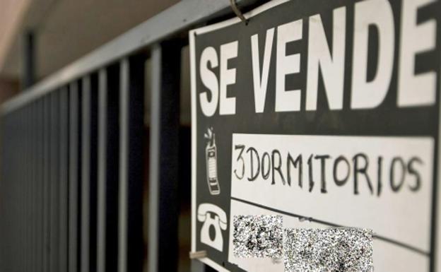 Cartel de venta de una vivienda./