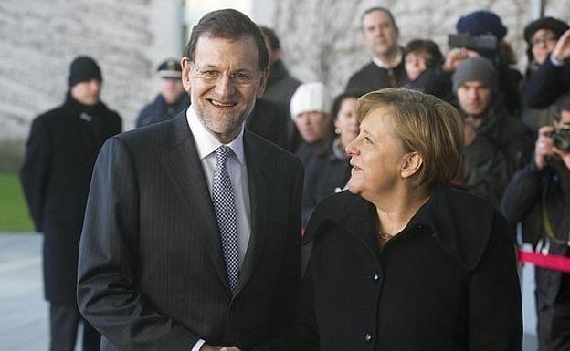 Rajoy y Merkel, durante uno de sus encuentros bilaterales./Agencias