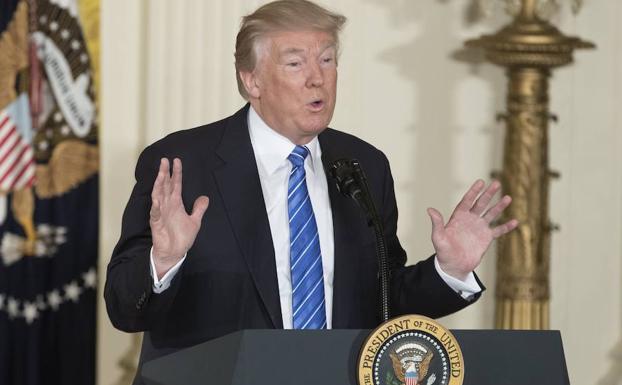 La Corte Suprema de EE UU permite parcialmente el decreto migratorio de Trump