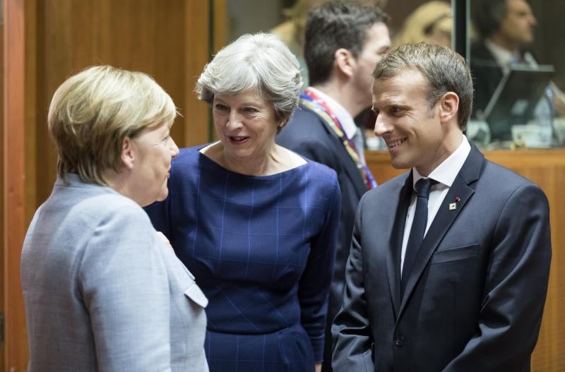 Merkel y Macron expresan su apoyo a Rajoy en Bruselas