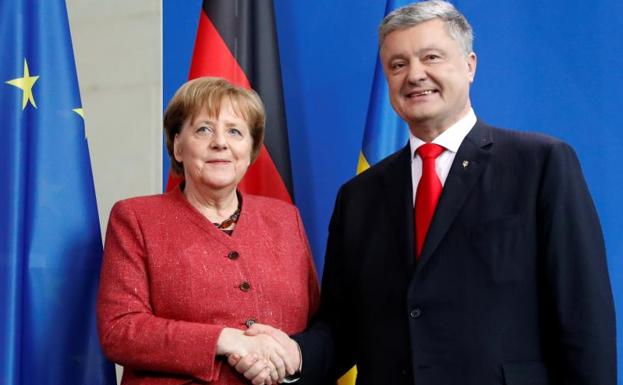 Merkel recibe a Poroshenko una semana antes de las elecciones de Ucrania