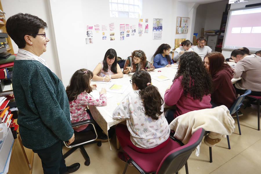 Los voluntarios y usuarios del centro