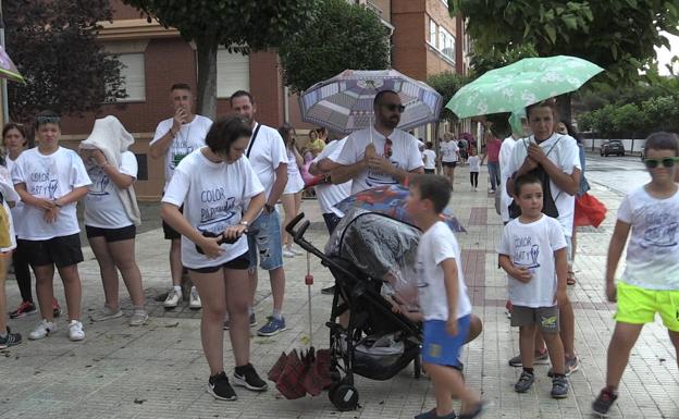 La lluvia y el viento obligan a suspender la carrera de la Color Party de La Virgen del Camino