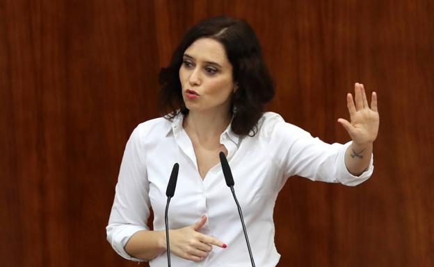 Ayuso logra su investidura en Madrid tras comprometerse a cumplir el acuerdo con Vox