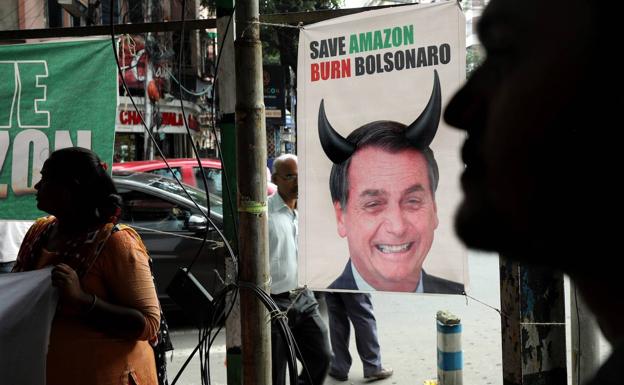 Bolsonaro aceptará la ayuda externa para los incendios en el Amazonas si puede decidir cómo usarla