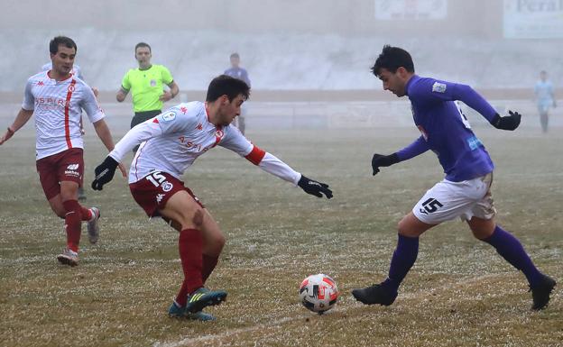 La Bañeza y el Júpiter firman tablas entre la niebla de la Llanera