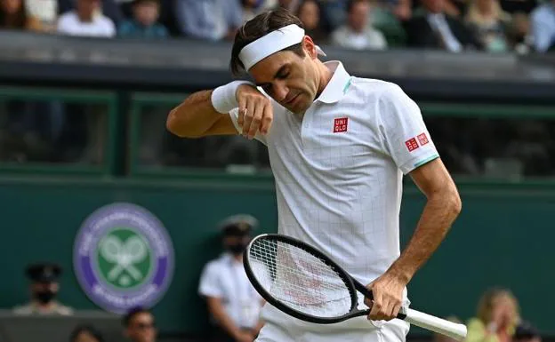 Roger Federer, con gesto abatido. /Glyn Kirk (Afp)