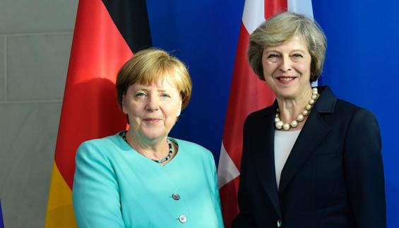 Merkel y May apuestan por un diálogo constructivo ante un 'Brexit' inevitable
