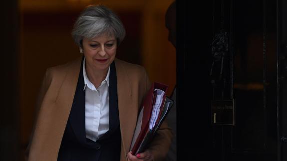 Optimismo y repetición en el anuncio de May al Parlamento británico