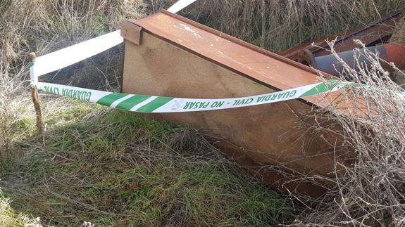 Trasladan el ataúd hallado en el vertedero de El Burgo Ranero para identificar a la mujer enterrada